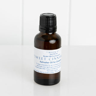 Malka Sweet Cinnamon Essential Oil in a 30ml bottle