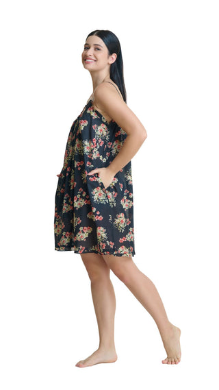 Woman wearing a floral dress on a white background