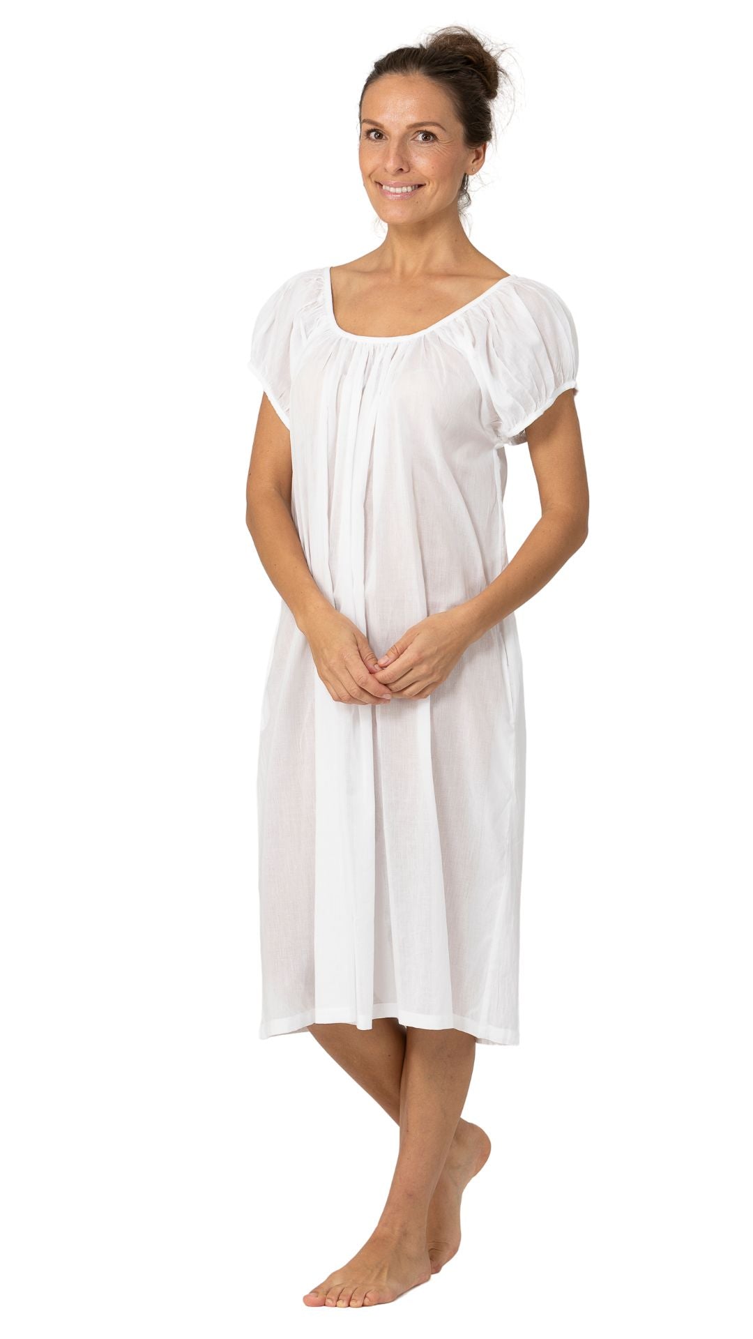 white fine cotton night gown on model