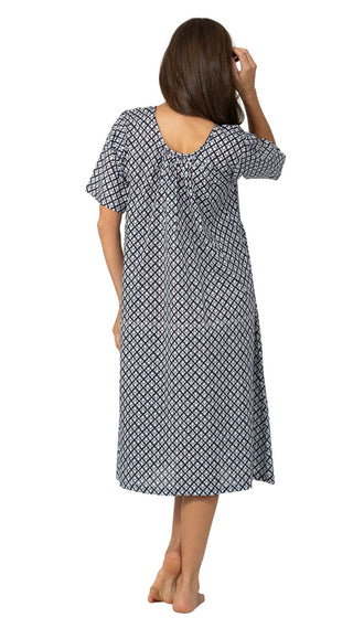 back view of light cotton night dress on model