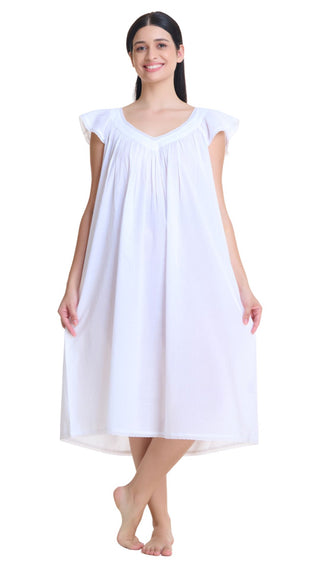 Woman wearing a white nightgown on a white background