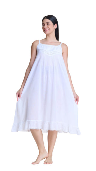 Woman wearing a white sleeveless dress on a white background