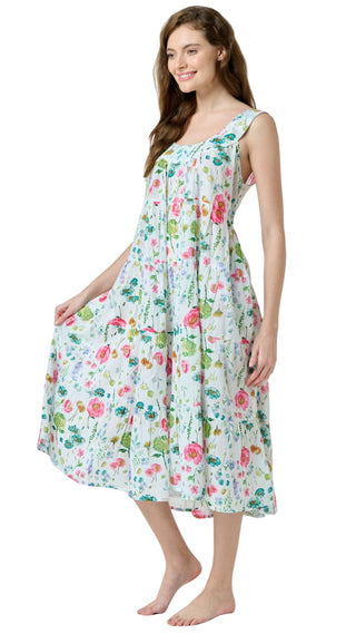 Woman wearing a maxi floral nightie dress on a white background