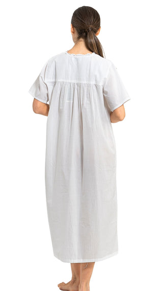 Short sleeve older ladies nighties in white on model