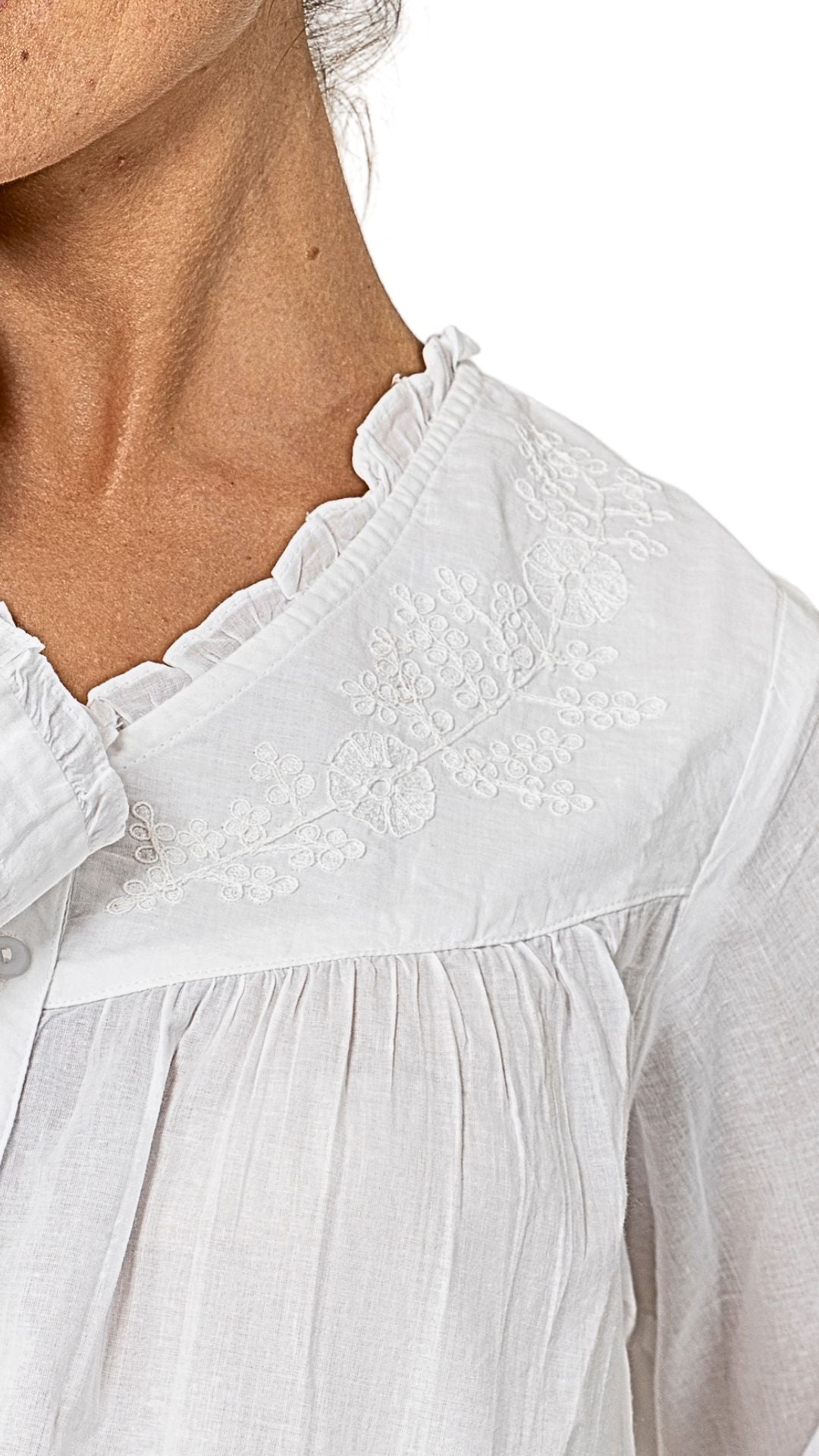 Embroidered white cotton nightie - neckline detail on model