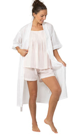 Short sleeve bath robe in white cotton on model 
