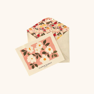 Floral card and envelope set on a white background