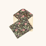 Floral patterned paper with a matching envelope on a white background